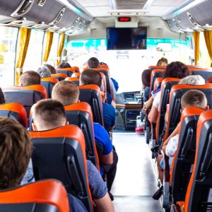 passengers-riding-bus-rear-view